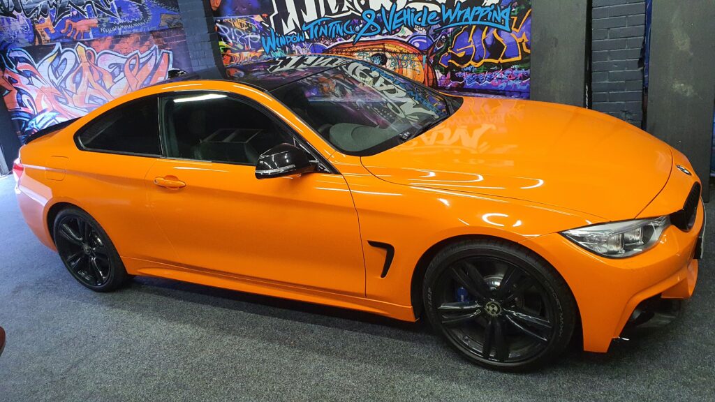 bmw wrapped in gloss orange wrap vehicle wrapping middlesbrough